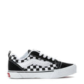 Kids low-top sneaker side view, black canvas with white checkered band, lace-up