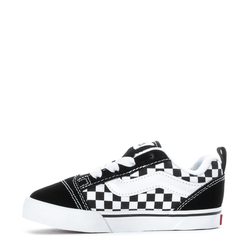 Toddler black and white checkerboard sneakers, lace-up, white rubber sole.
