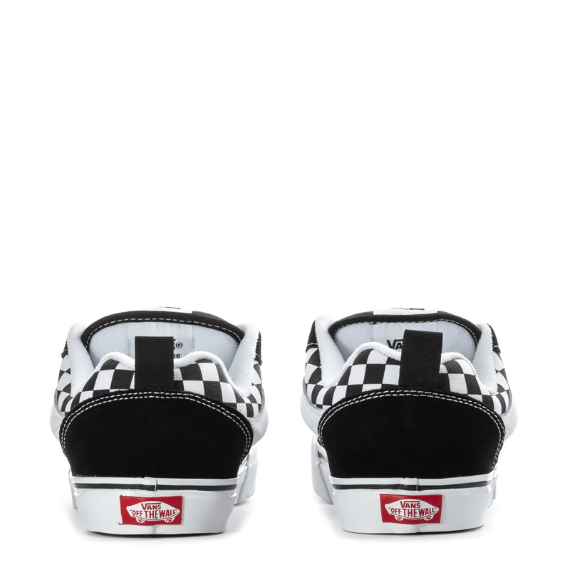 Youth sneakers heel view with checkerboard back panels, white midsoles, black lining