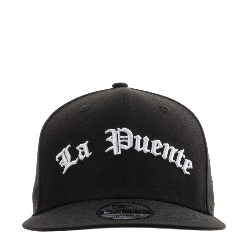 La Puente 950 black baseball cap with white arched logo