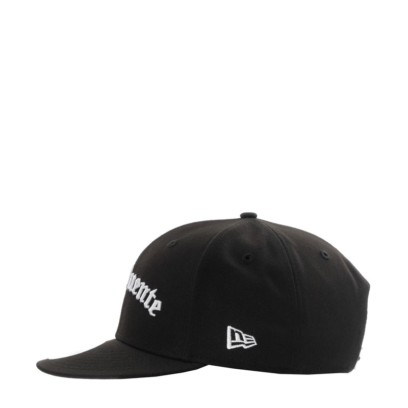 Black baseball cap with front New Era logo patch and side text