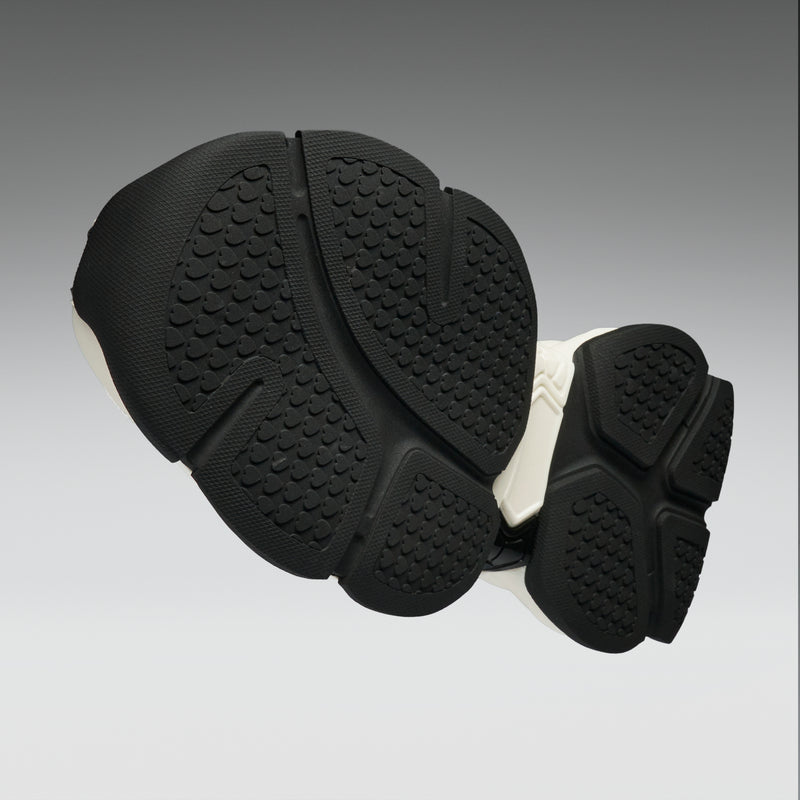 Black protective knee pads on a gray background