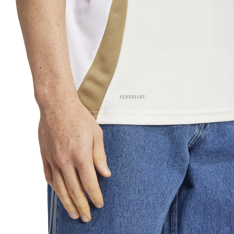 White jersey back hem with AEROREADY text and gold side panel stripe