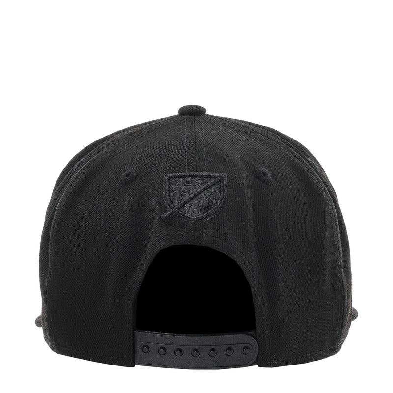 Black baseball cap with embroidered shield logo on the back