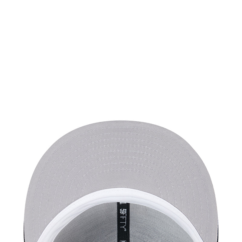 Grey baseball cap interior with white brim and vertical New Era label