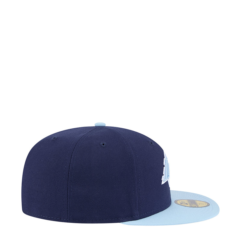 Two-tone baseball cap, dark navy front with light blue side brim