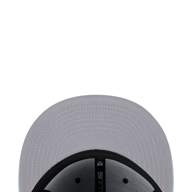 Two-tone baseball cap interior close-up, light gray crown with dark inner band