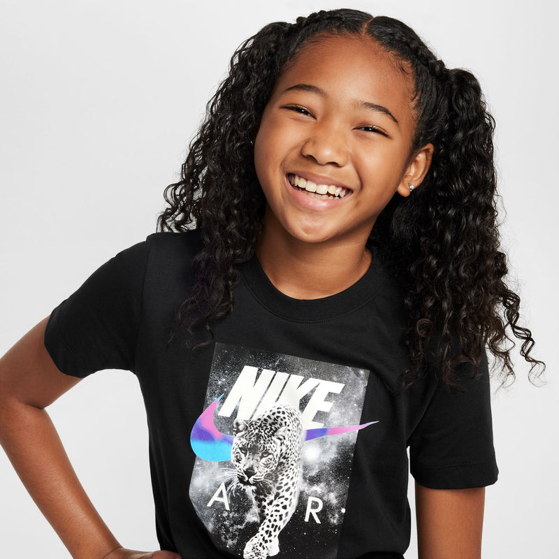Black youth graphic T-shirt with NIKE leopard photo chest graphic in gray and blue.
