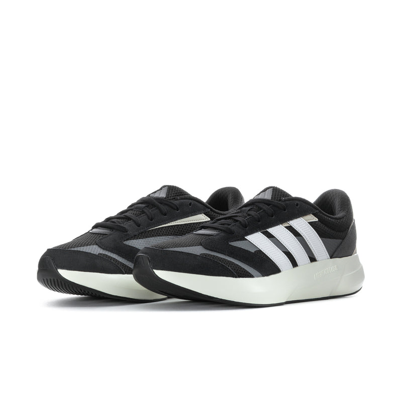 Lightshift men's black and white sneakers, side view with three-bar logo and laces