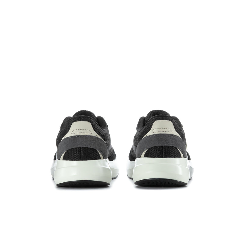 Lightshift men's sneakers, heel view with black upper and light sole
