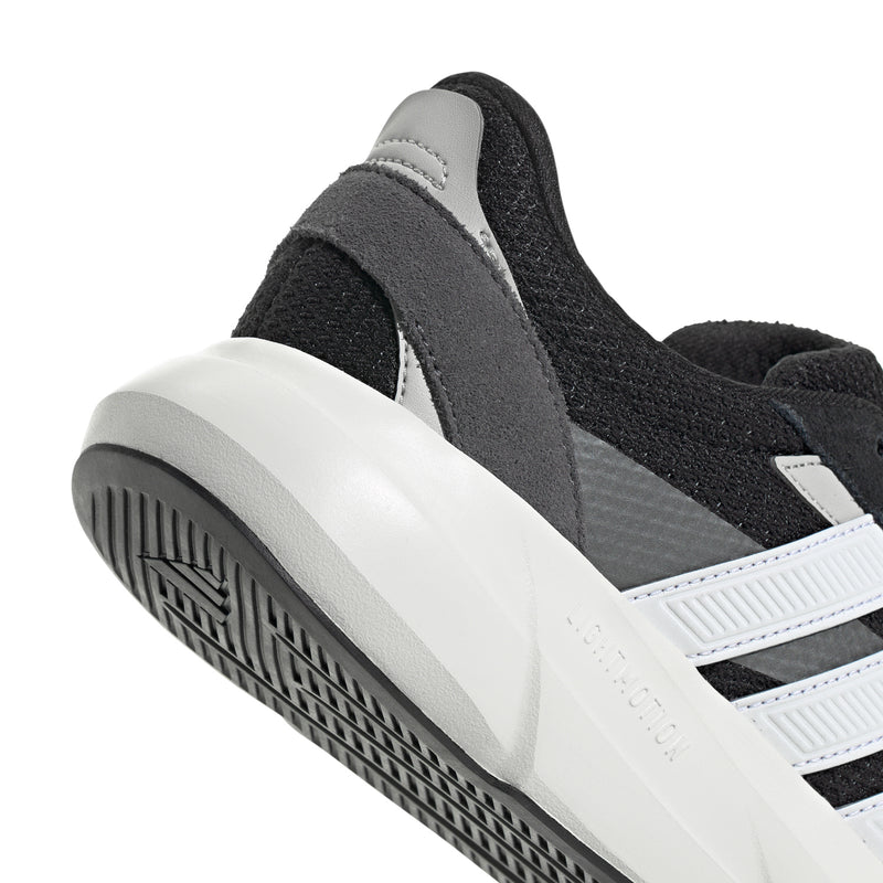 Lightshift men's sneaker close-up, gray collar lining and black upper with white stripe
