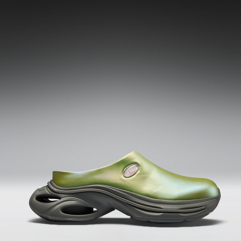 Green and gray shoe on a gradient background