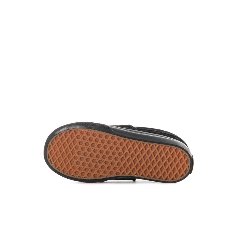 Black toddler loafer outsole with tan waffle tread