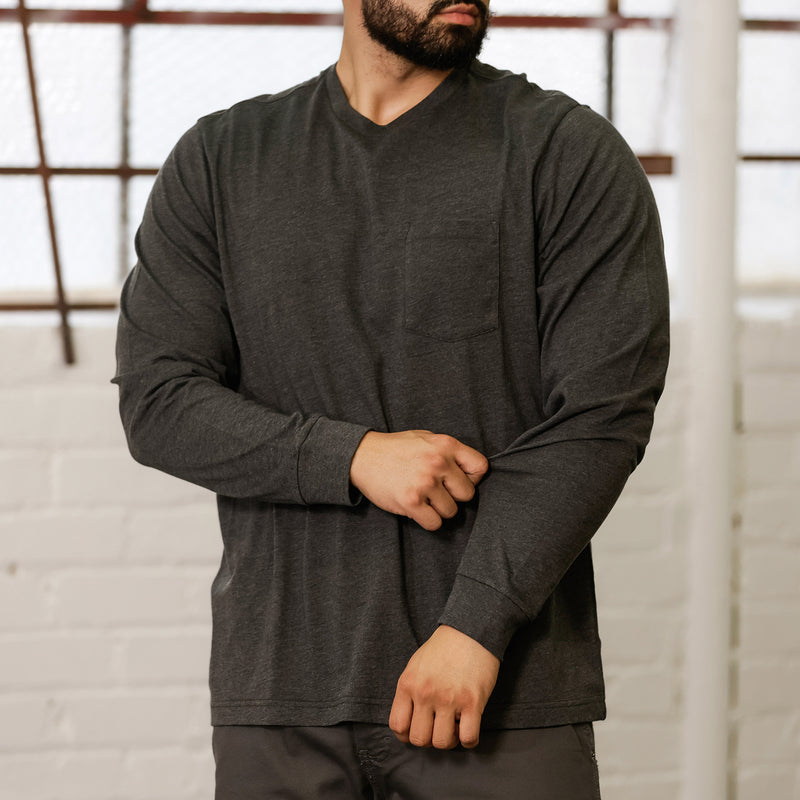 Men's charcoal grey long-sleeve crew neck work shirt, front view on model