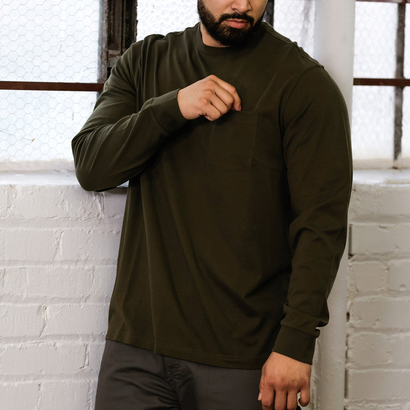 Olive men’s long-sleeve work shirt close-up: crew neck and front pocket