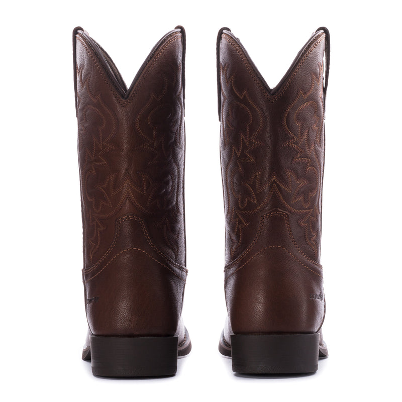 Brown cowboy boots back view with embossed panel details and block heel.