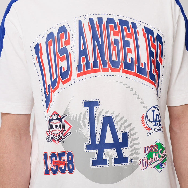 Close-up of Dodgers front graphic on white varsity baseball tee