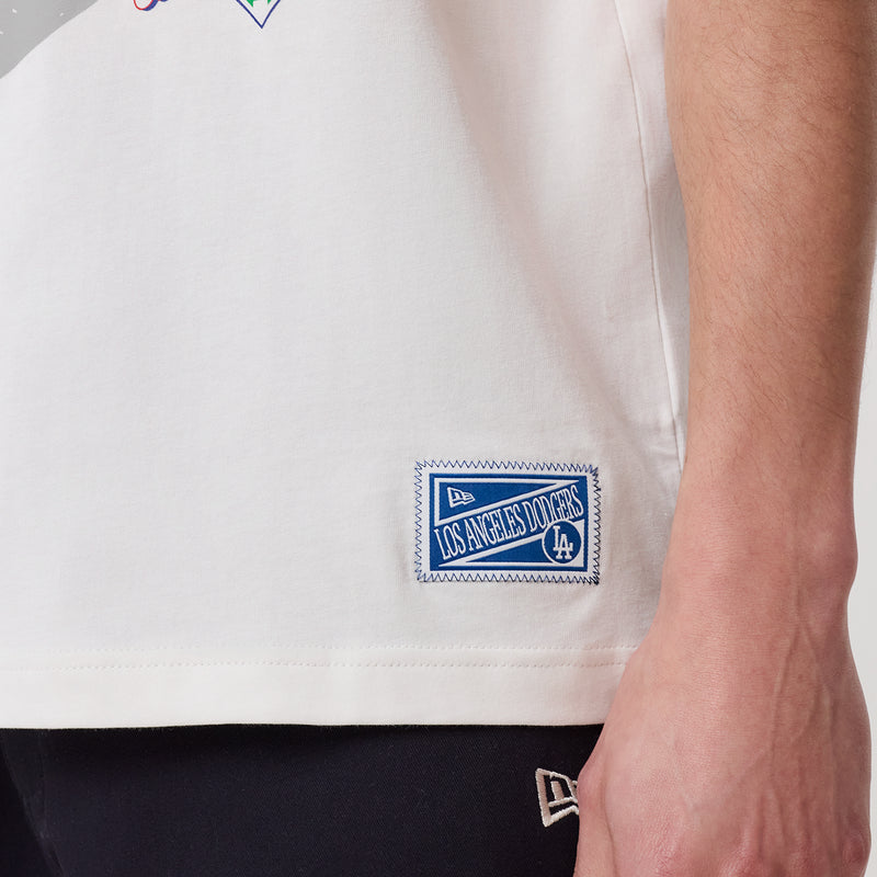 White hem of Dodgers varsity tee with embroidered New Era label