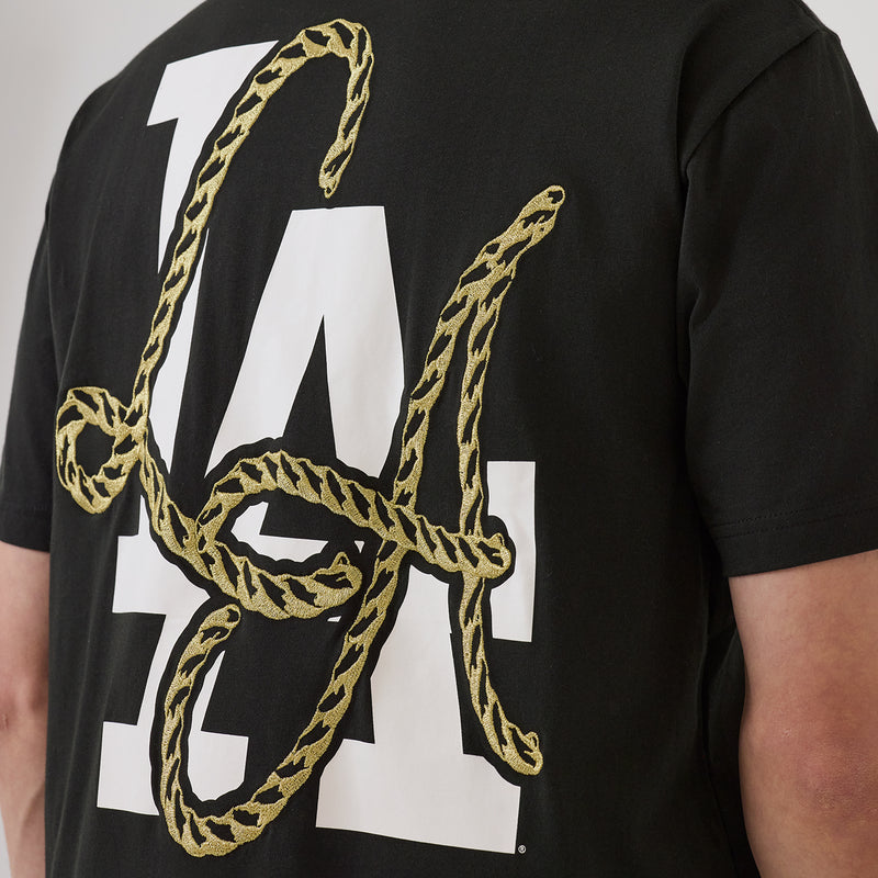 Men's black T-shirt close-up of large LA monogram with rope detail