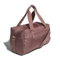 Warm clay pink duffel bag with padded handles and side zipper pocket