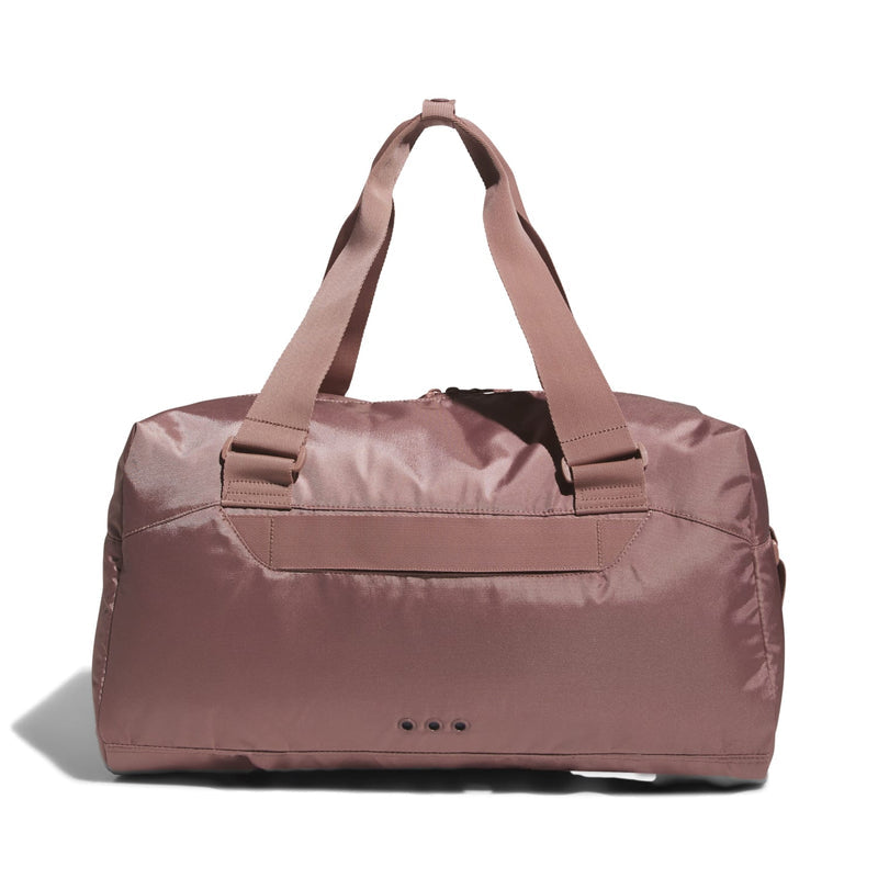 Warm clay pink duffel bag front view with adjustable shoulder strap