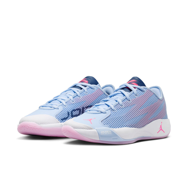 Men's light blue lace-up sneakers with pink outsole accents and Air cushioning