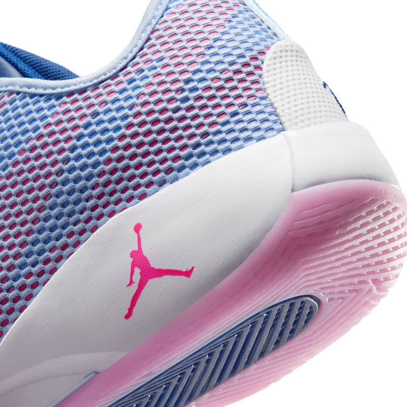 Men's sneaker side close-up with pink Jumpman emblem and patterned pink sole