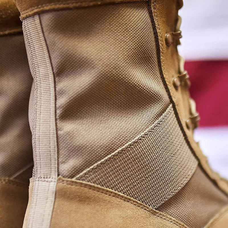 Close-up of GORUCK tan rucking boot with durable fabric and rugged stitching details.