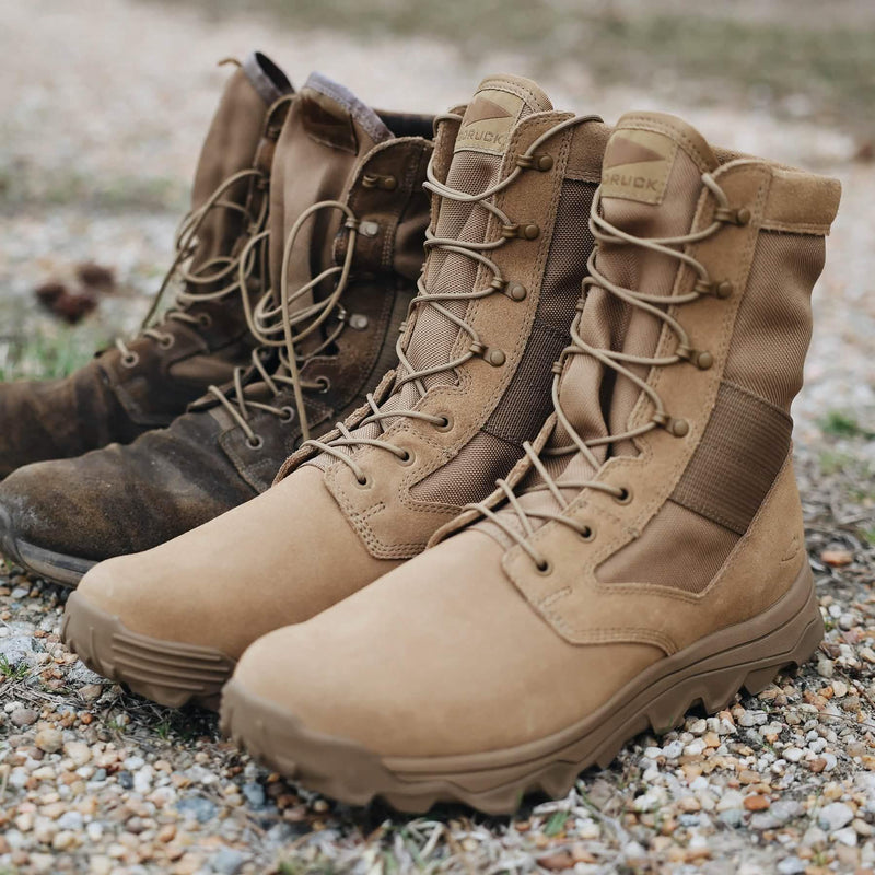 GORUCK tan rucking boots with rugged soles on gravel, ideal outdoor ruck footwear