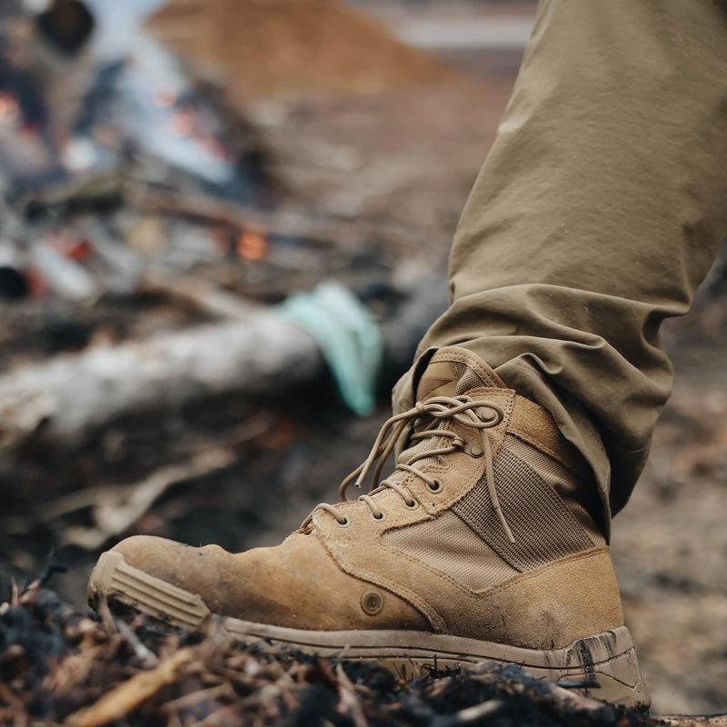 GORUCK rugged brown rucking boot outdoors, durable footwear in action by a campfire