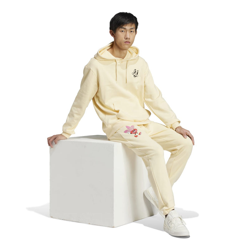 Warm vanilla pullover hoodie with cartoon chest graphic, relaxed fit