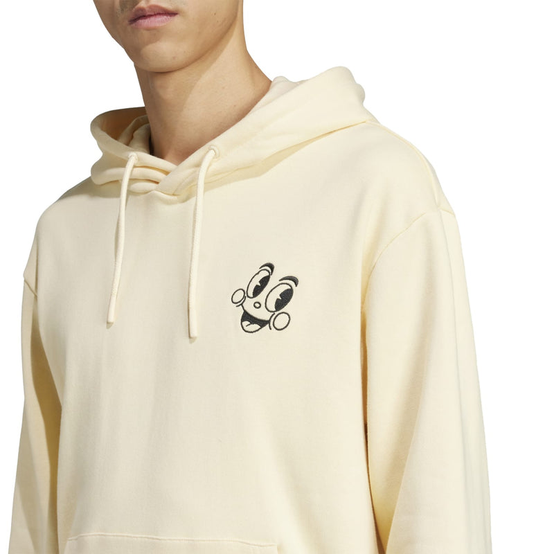 Warm vanilla hoodie with small black cartoon graphic on chest