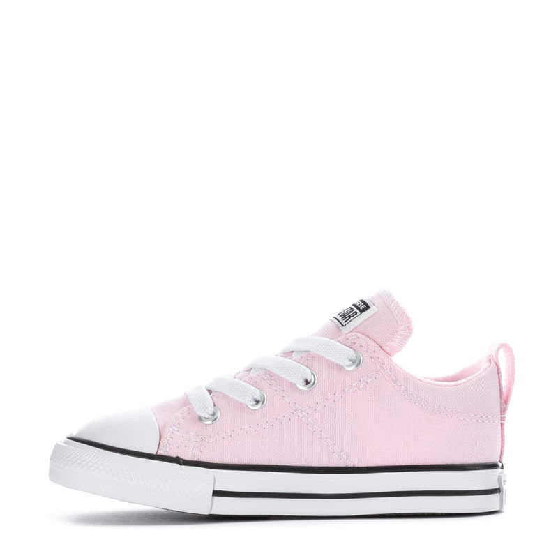 Pink toddler low-top sneaker, side view with lace-up eyelets and black stripe sole
