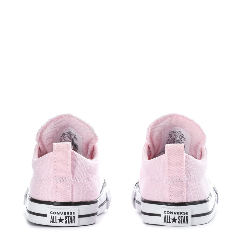 Pink toddler low-top sneakers showing heel tabs and Converse All Star patch