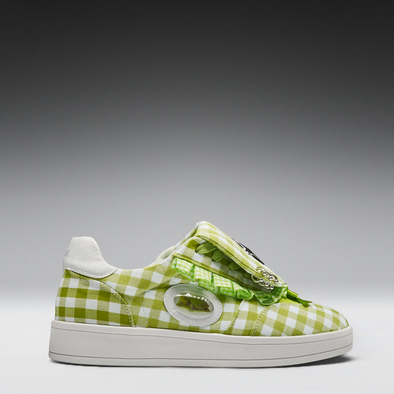 Green checkered sneaker with a white sole on a gray background