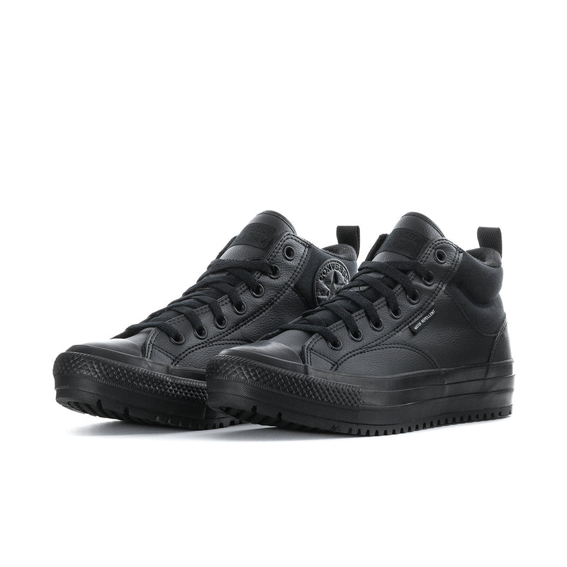 Black high-top lace-up boots pair with textured rubber outsole and thick tread
