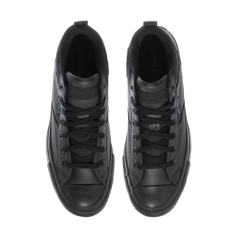 Black lace-up high-top boots front view with padded tongue and metal eyelets