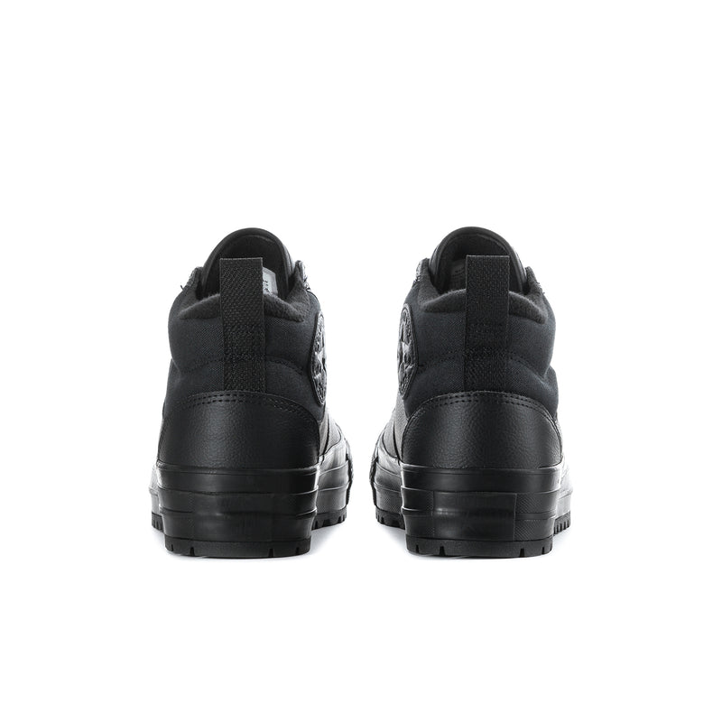 Black high-top lace-up boots back view with pull tab and stacked heel
