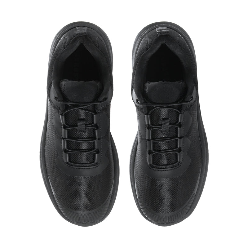 Pair of men's black sneakers, front view with lace-up straps and cushioned tongue