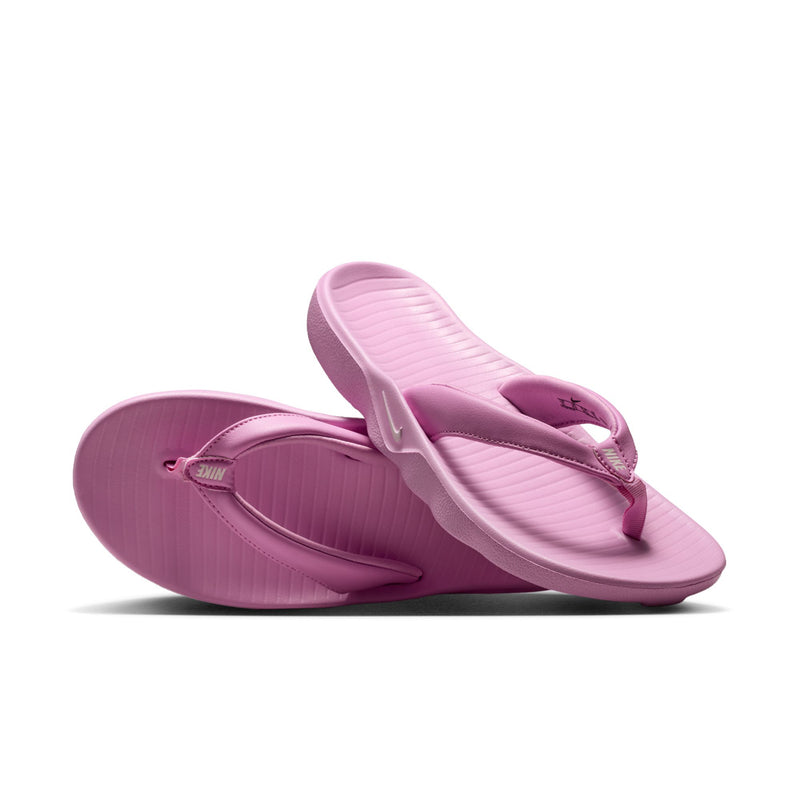 Women’s light magenta thong sandals with textured footbed and curved strap