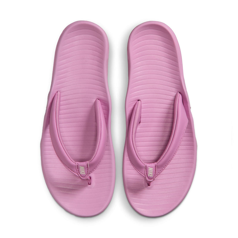 Pair of light magenta thong sandals with contoured straps and textured soles