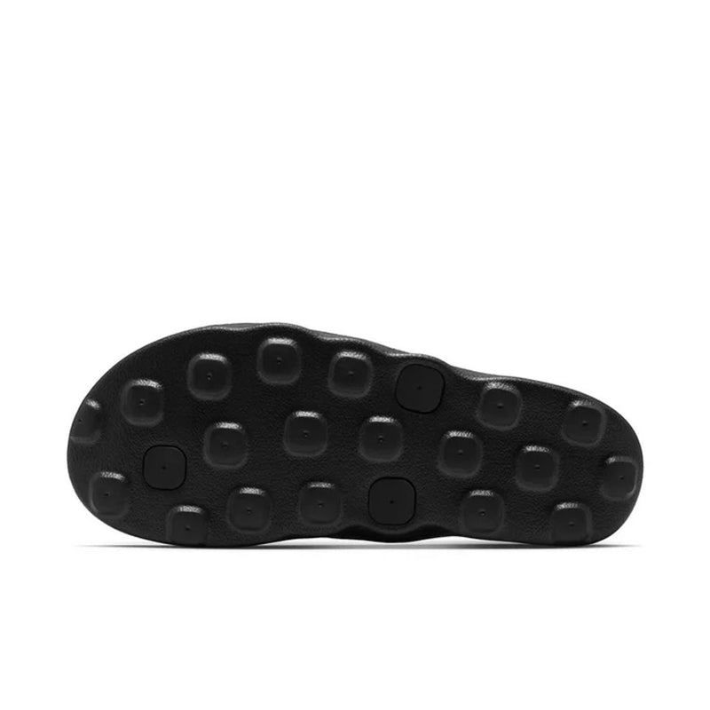 Women’s black flip-flop sandal outsole with round traction nubs