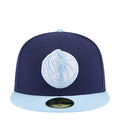 Two-tone navy baseball cap with light gray brim and round light-blue logo