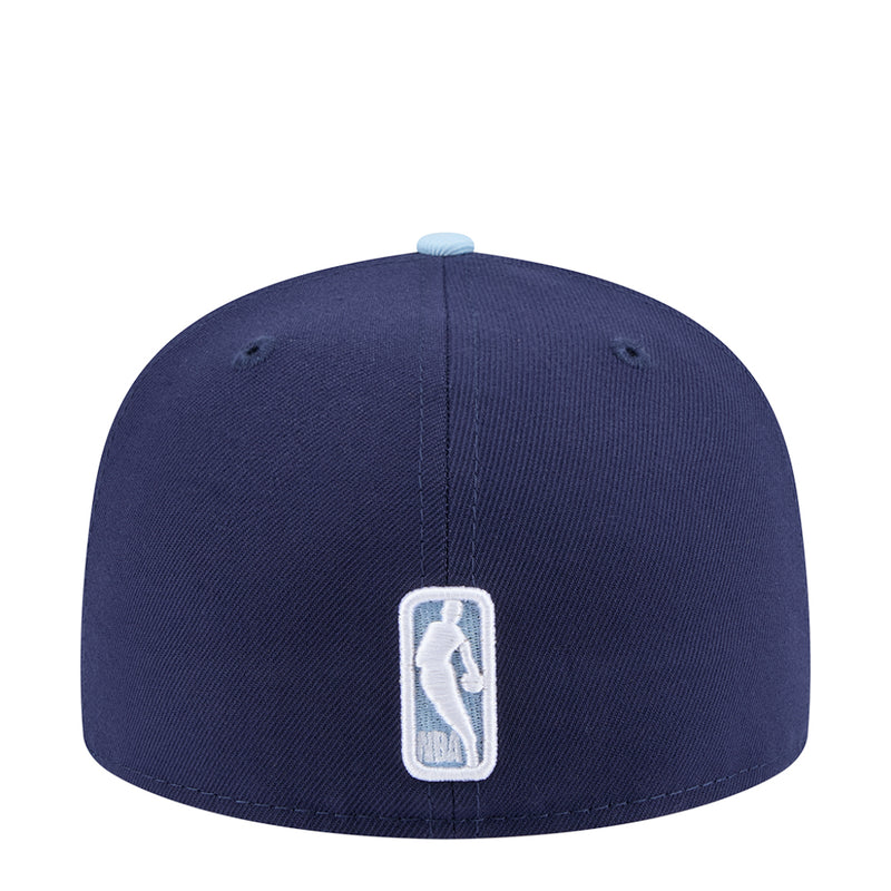 Navy baseball cap with light gray brim and white vertical player logo