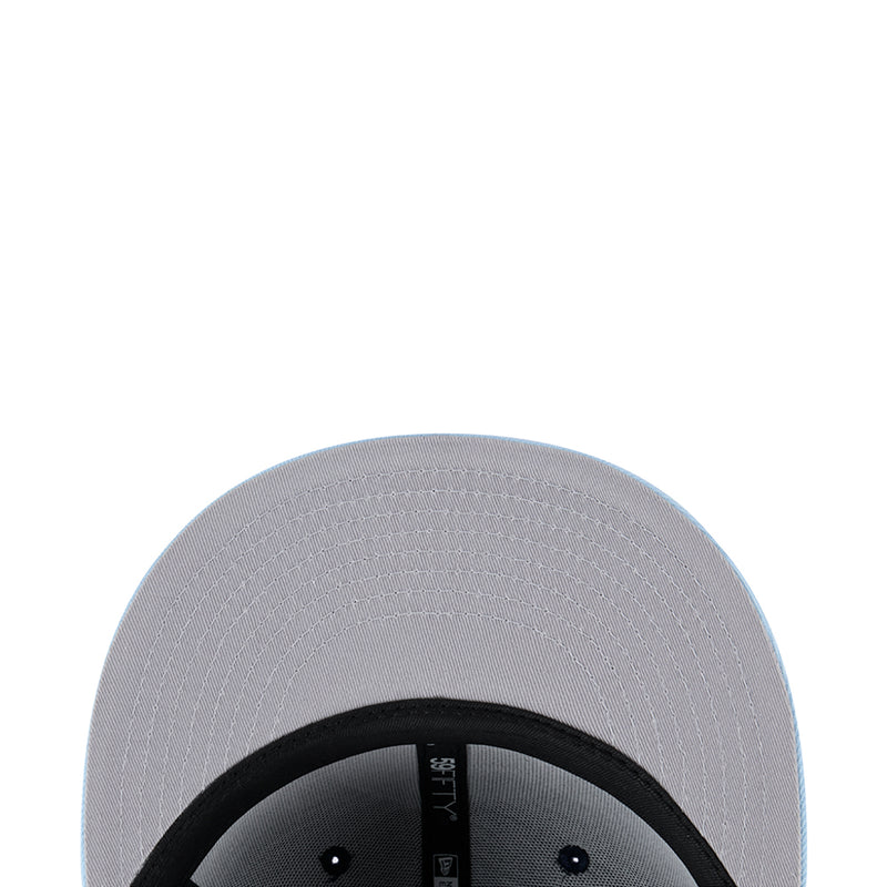 Light gray baseball cap with black inner band, close-up