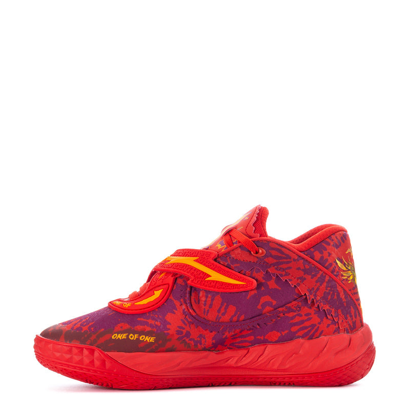 Red low-top basketball sneaker with purple patterned upper and neon yellow accents, front view.