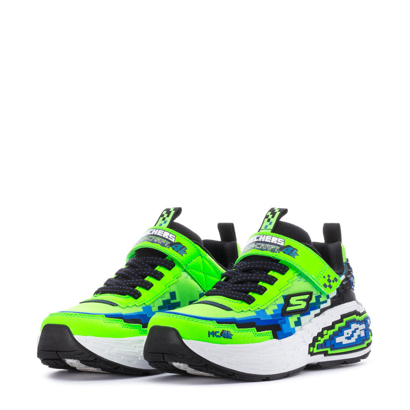 Kids lime green and black sneakers with blue pixel accents and chunky sole