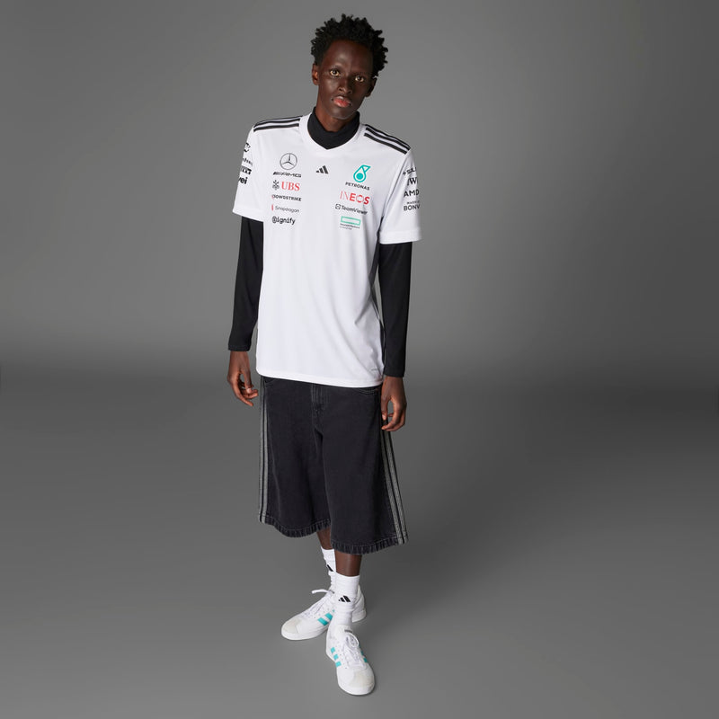 Men's white replica football jersey with black-trim collar and sponsor logos at the chest.