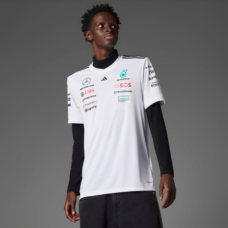 Men's white replica football jersey with black collar trim and sponsor logos on chest.