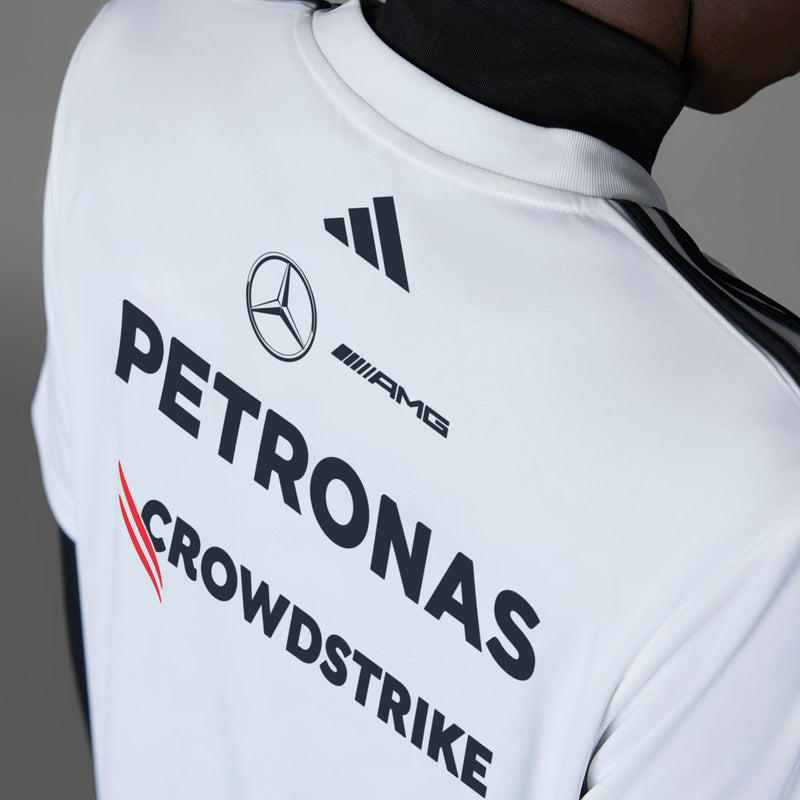 White replica jersey with PETRONAS and CrowdStrike sponsor graphics, black collar trim.